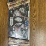 A package of the engine gasket set is shown.