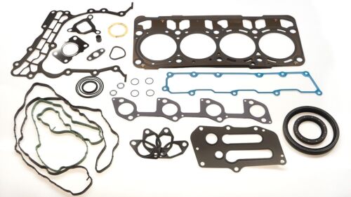 A group of gaskets and seals are laid out on the table.